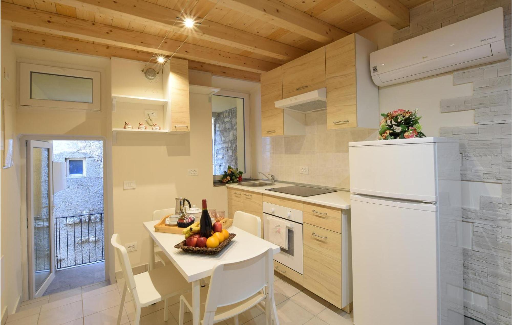 Stunning Apartment In Monte Isola With Kitchen Exterior photo